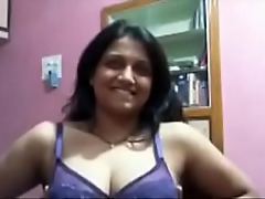 Sultry Indian aunt indulges in steamy, sensual sex with her seductive moves.
