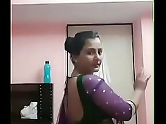 Curvy Desi hottie Pooja Bhabhi seduces with her sensual dance.