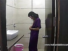 Desi MILF Bhabhi flaunts her ample assets in a steamy MMS video, leaving nothing to the imagination.