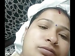Indian aunty gets wild on camera, delivering hot Tamil sounds and sensual moves in a live show.