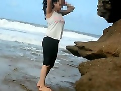 Desi girl Farhana R gets wild and uninhibited on a beach sex tape.