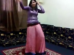 Charming Pakistani beauty seductively dancing with sensual moves.