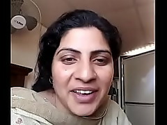 Sultry Pakistani aunt indulges in steamy sexual encounters.