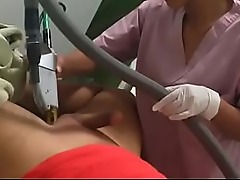 Indian hottie gets her shaved pussy zapped with a laser, leading to intense pleasure.