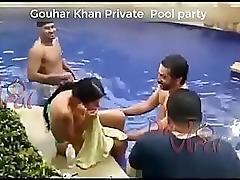 Indian aunty Gouhar Khan leads a raunchy group with confidence, flaunting her curves and pleasing everyone.
